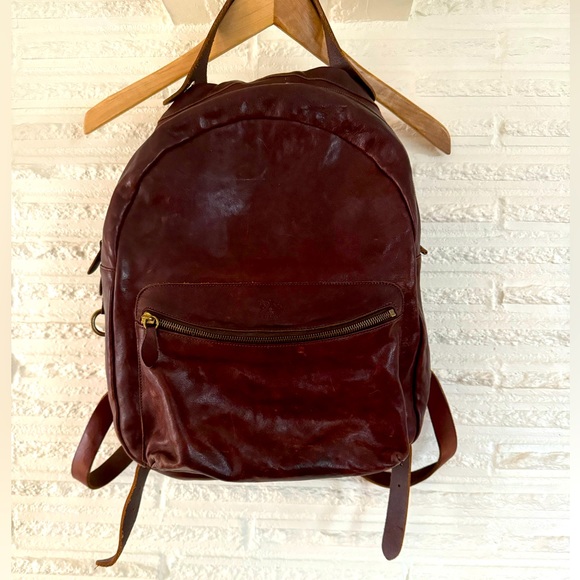Il Bisonte Handbags - Il Bisonte leather backpack with brass hardware, adjustable straps, front zipper